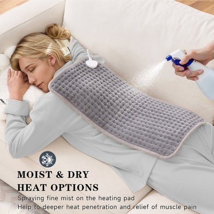 Woman lying on a couch with a heating pad, being sprayed with a mist, with text about moist and dry heat options.