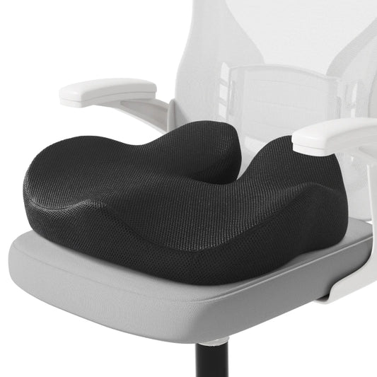 Black ergonomic seat cushion on a white office chair
