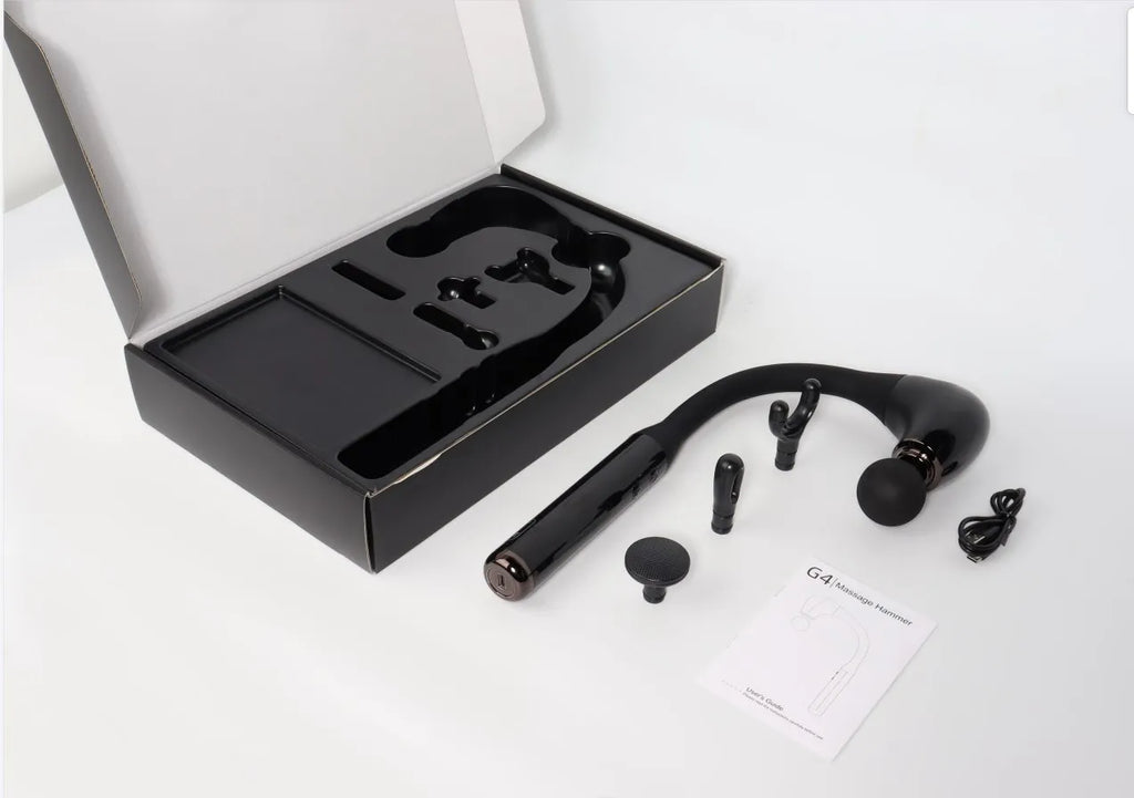 Black massage gun with accessories on a white background